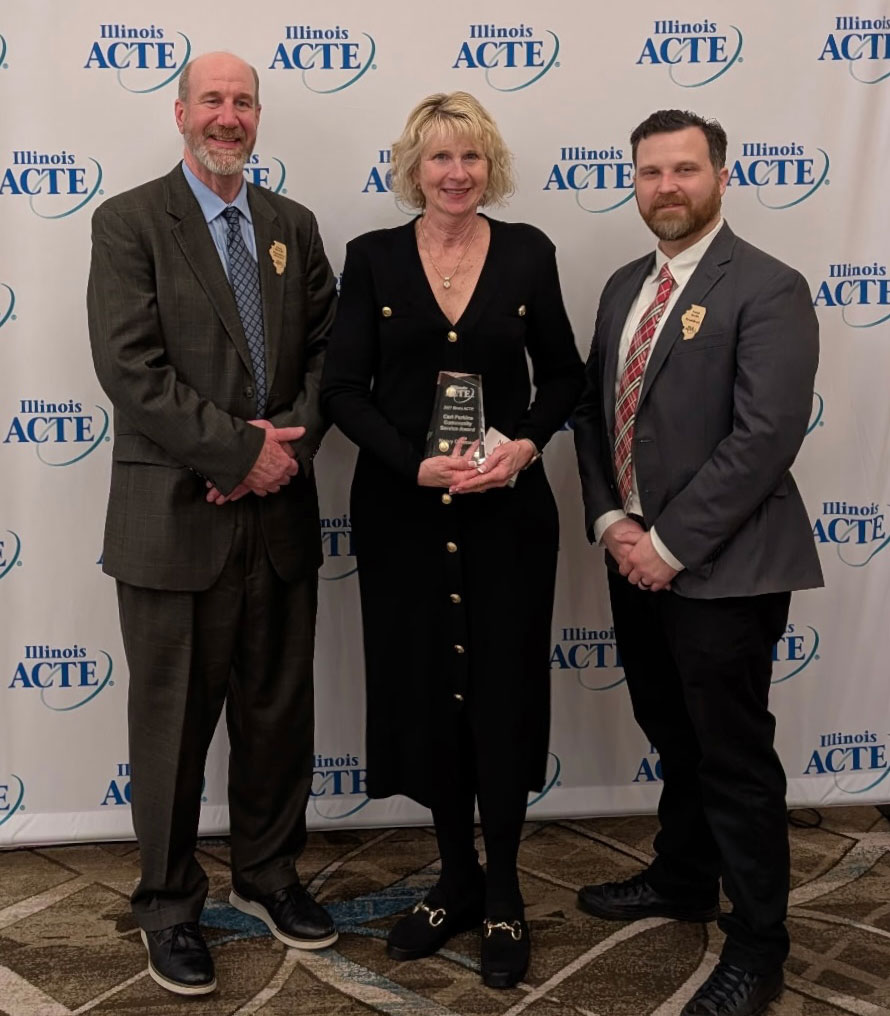 Nancy Coleman of Alignment accepts the IACTE Carl Perkins Community Service Award